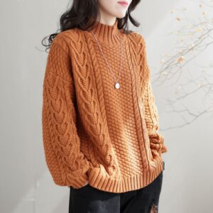 pull torsadé femme